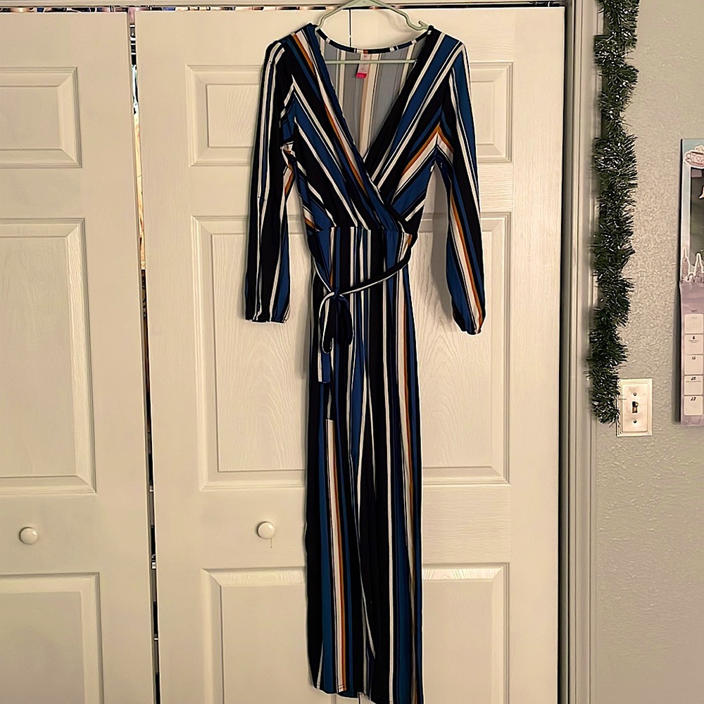 Multi colored jumper, never worn, super stretchy
